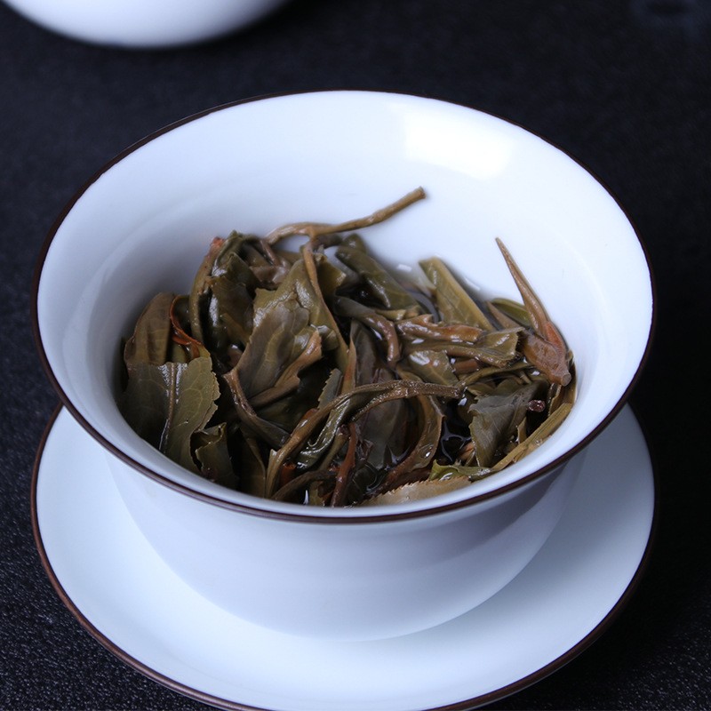 云南勐库华益茶厂普洱茶2014年单株古树生茶饼茶400g图4